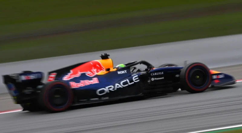 Isack Hadjar in the Red Bull RB22 at the Circuit de Barcelona-Catalunya