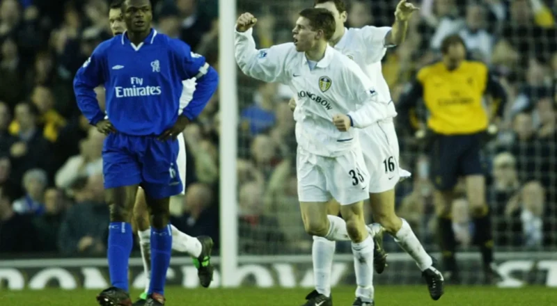 A 16-year-old James Milner celebrates scoring for Leeds against Chelsea in 2002