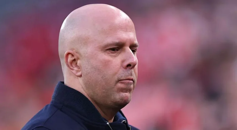 Liverpool manager Arne Slot looks glum on the touchline