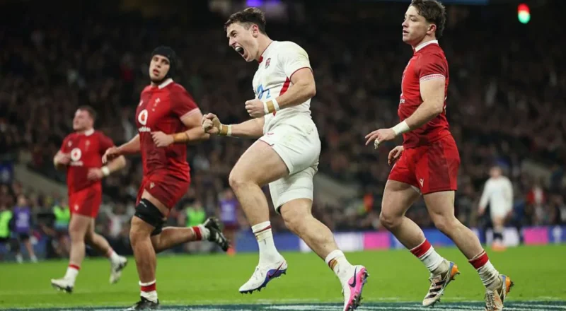 Henry Arundell celebrates scoring a try for England