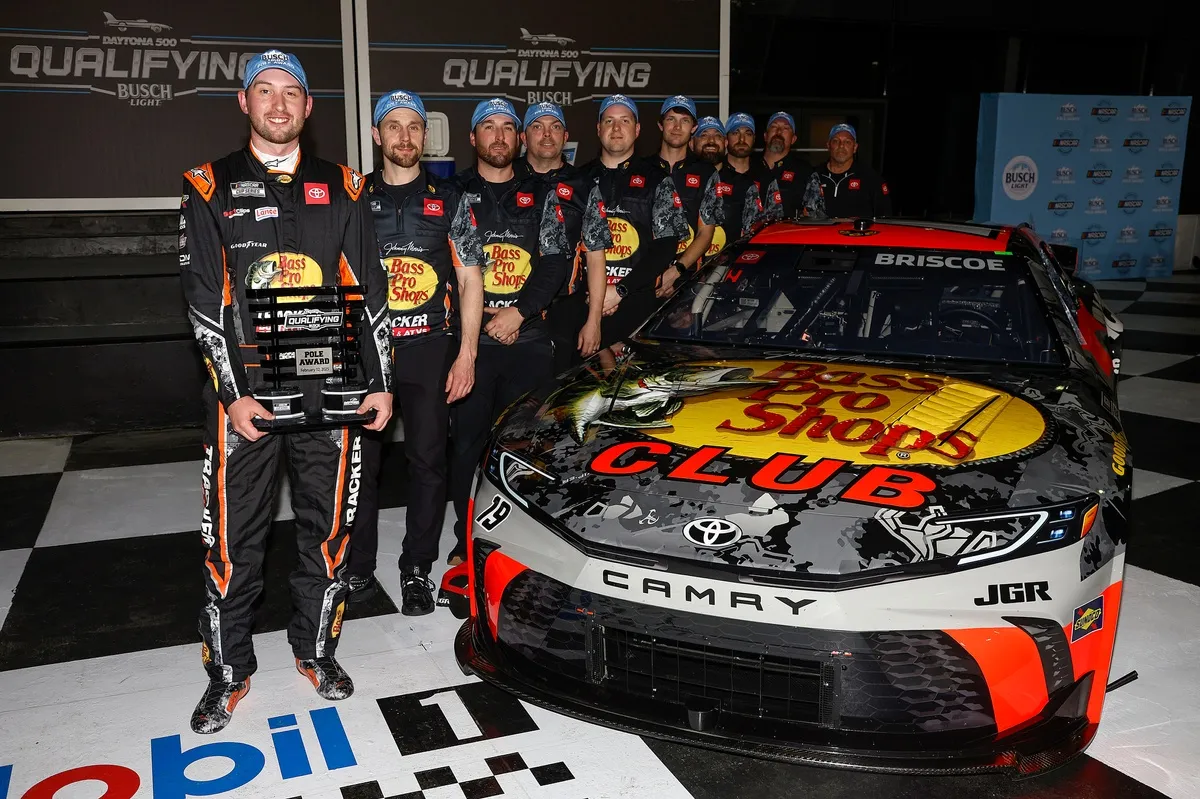 2025 Daytona 500 pole sitter Chase Briscoe, Joe Gibbs Racing Toyota with the crew