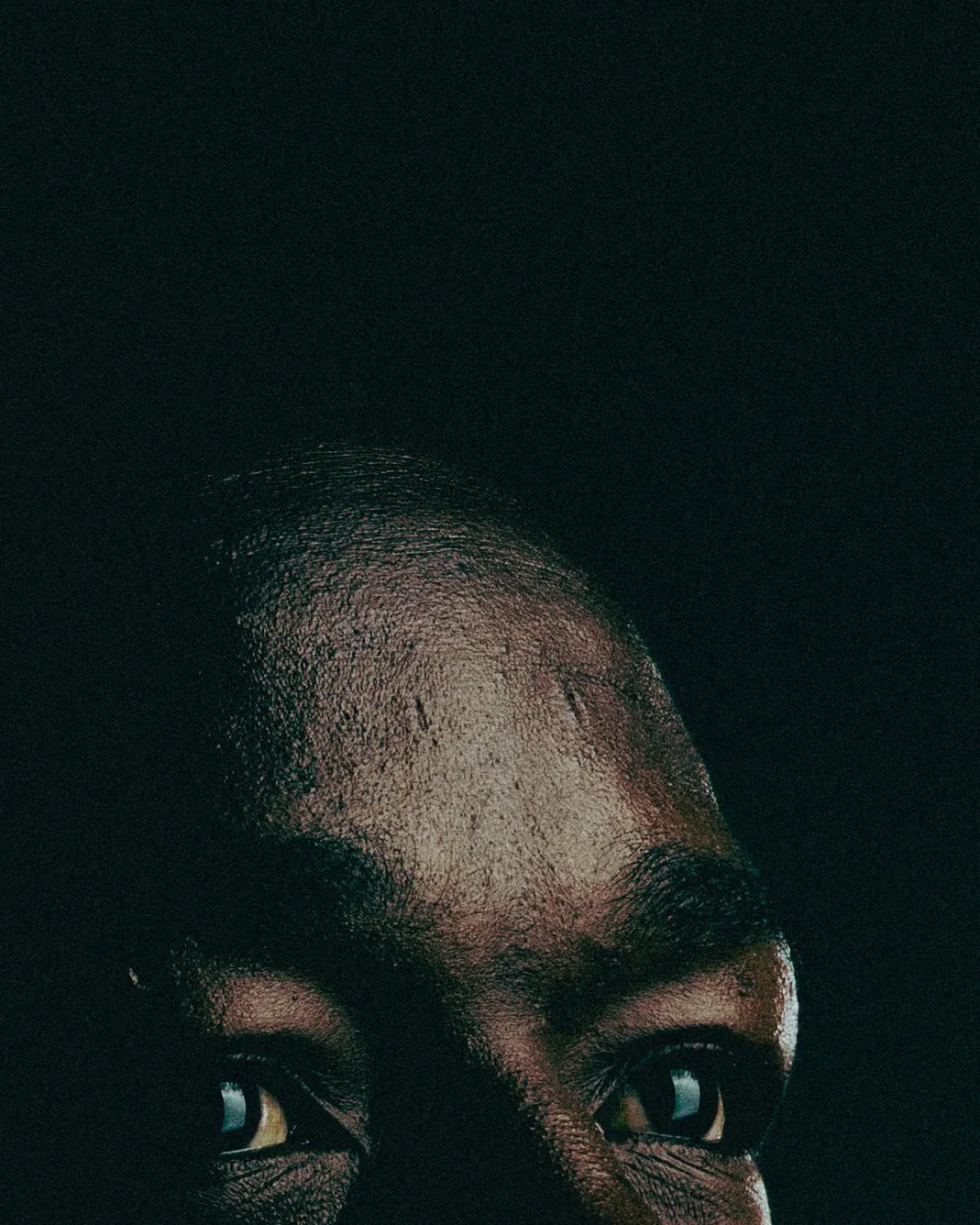 Nkosinathi Sibisi gazes into the distance.