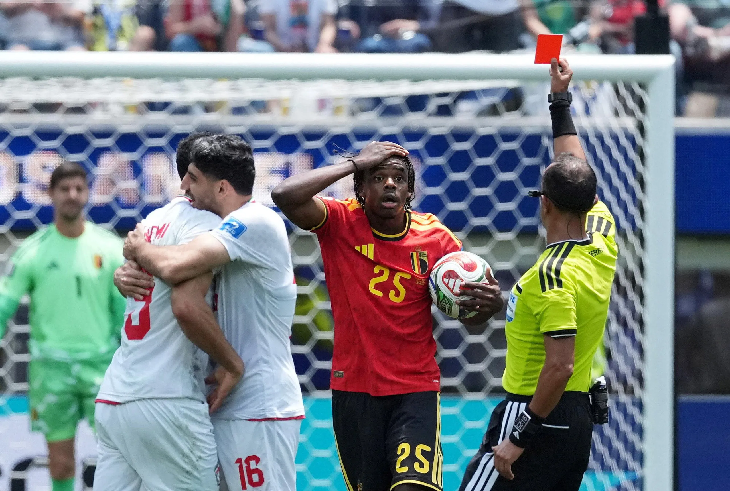 Belgium's Nathan Ngoy is sent off against Iran