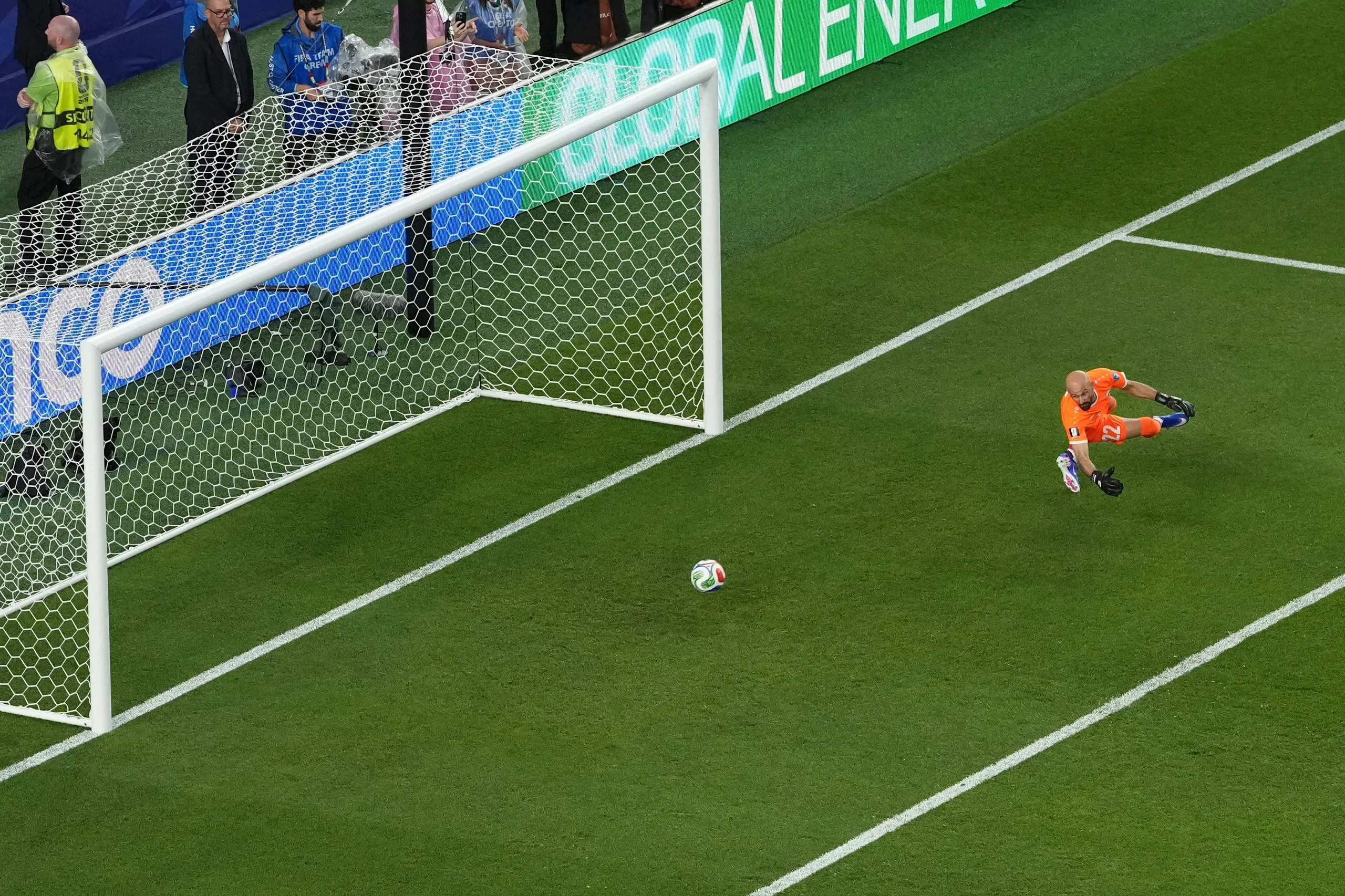 Iraq’s Ahmed Basil fails to stop a shot by France’s Ousmane Dembélé