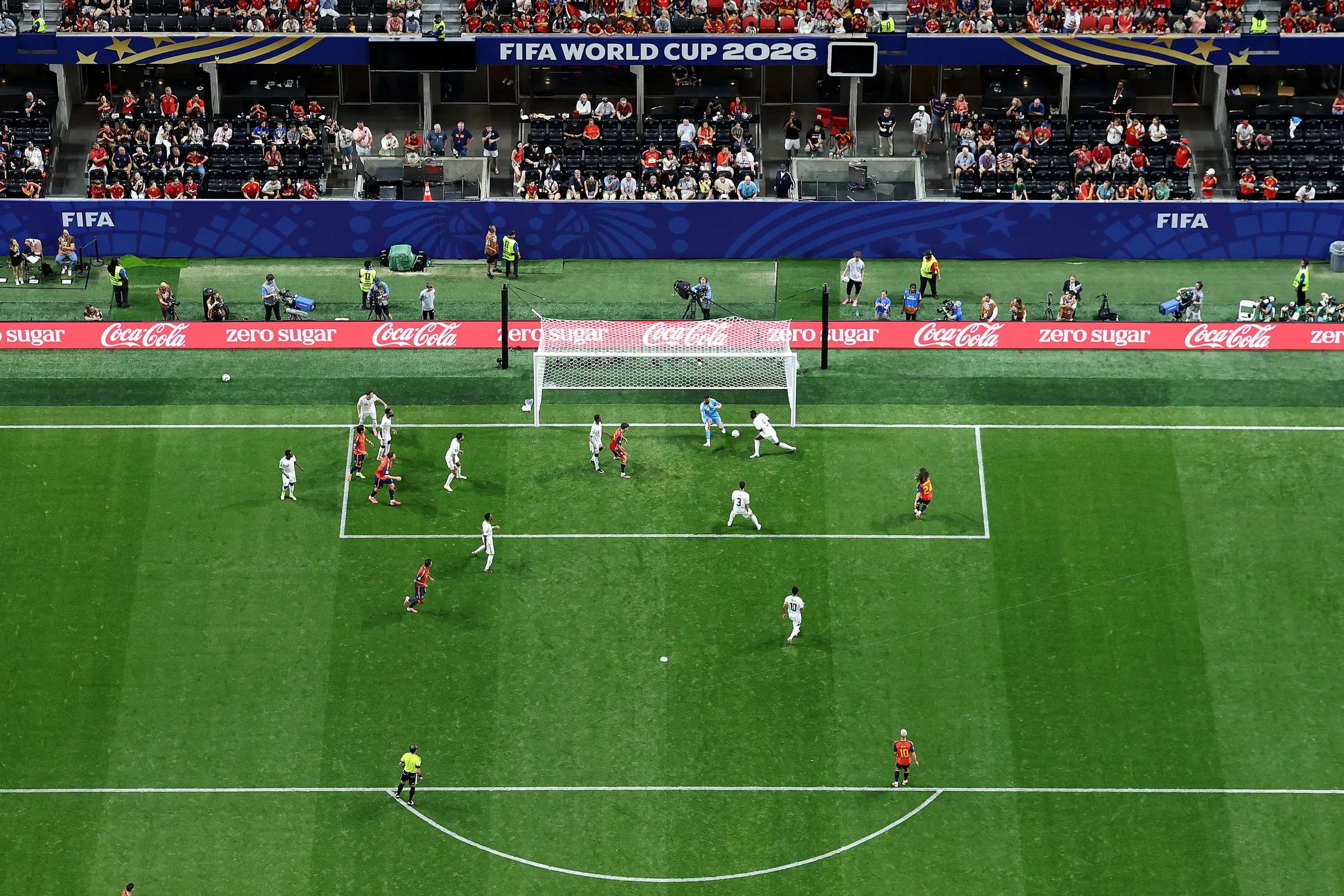 Marc Cucurella of Spain shoots at goal and it’s deflected in by Hassan Al-Tambakti of Saudi Arabia.