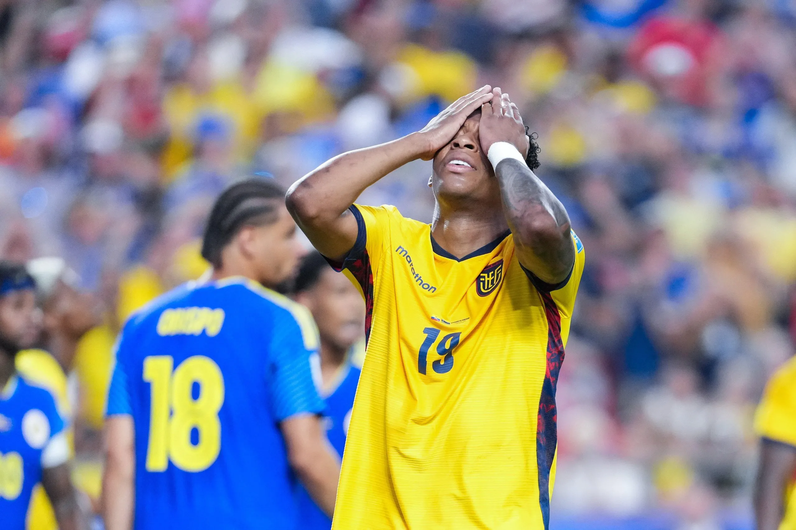 Ecuador’s Gonzalo Plata clutches his hands to his face