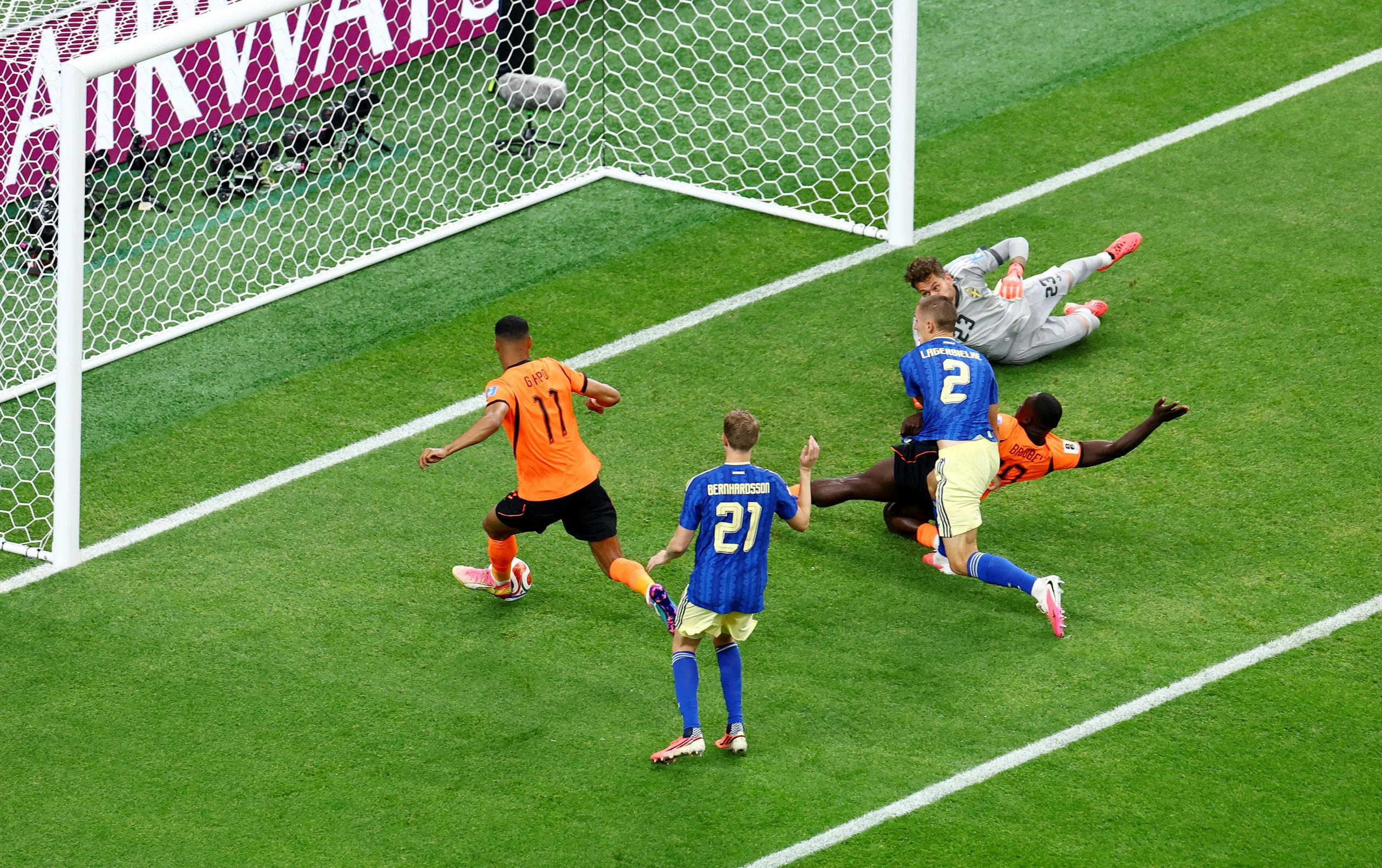 Netherlands’ Cody Gakpo scores the third goal against Sweden.