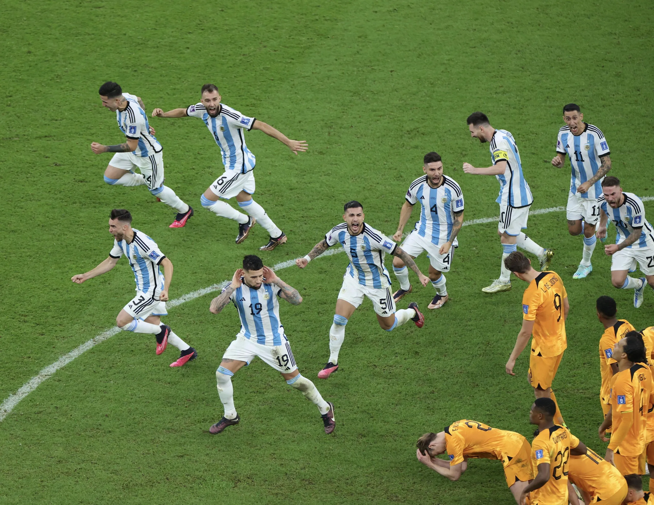 Argentina celebrate after beating the Netherlands on penalties in Lusail in 2022.