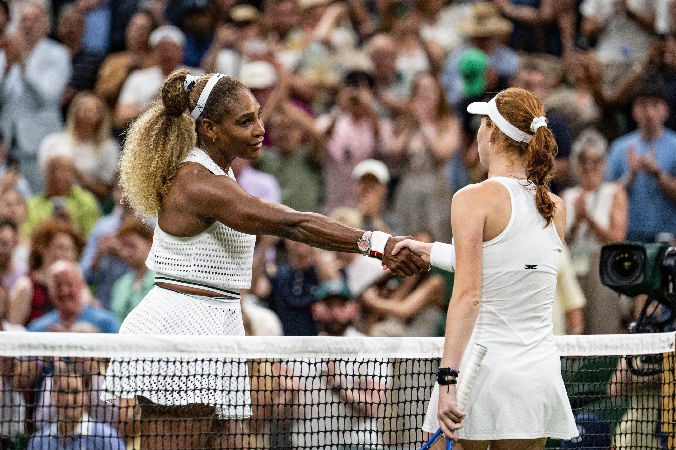 Serena Williams congratulates Maya Joint on her 6-3, 6-7, 6-3 win