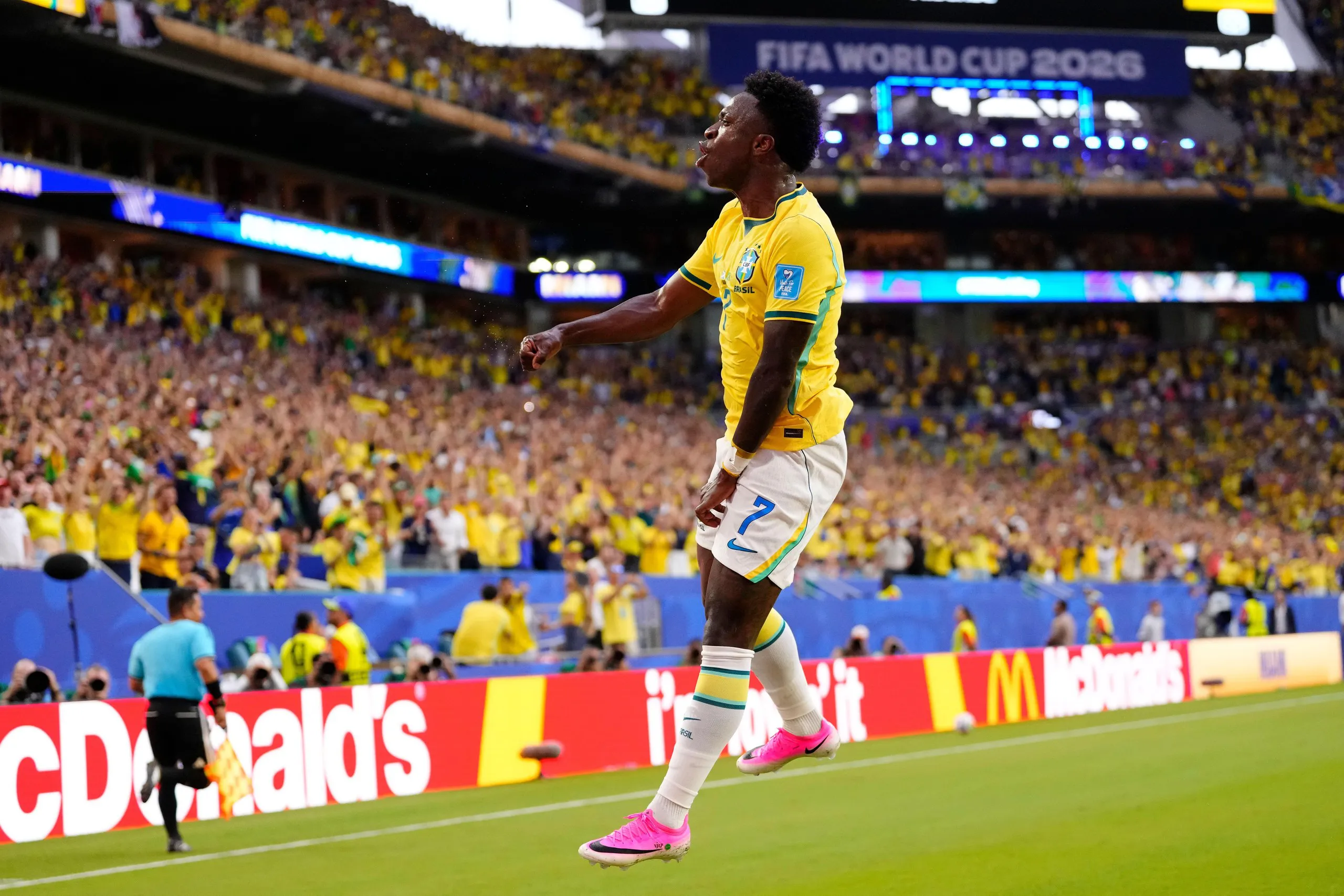 Vinícius Júnior jumps for joy after rolling the ball into the Scotland net for a second time, though the effort was ruled out by VAR