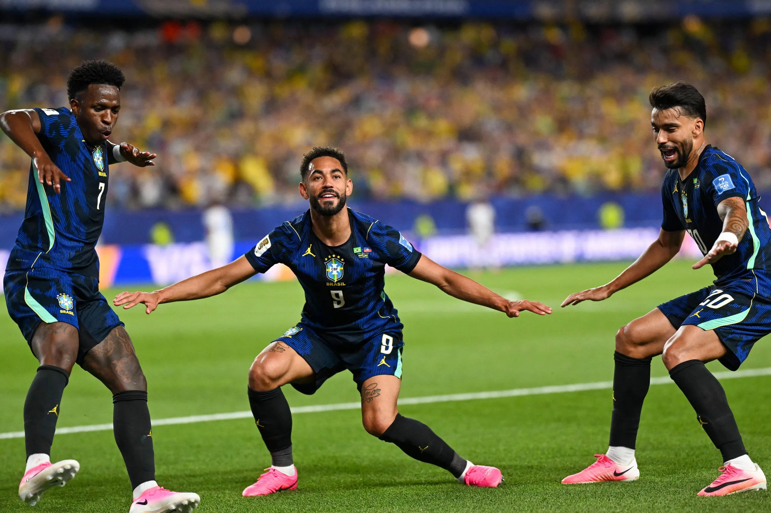 Matheus Cunha celebrates with Vini Jr and Lucas Paquetá after scoring against Haiti