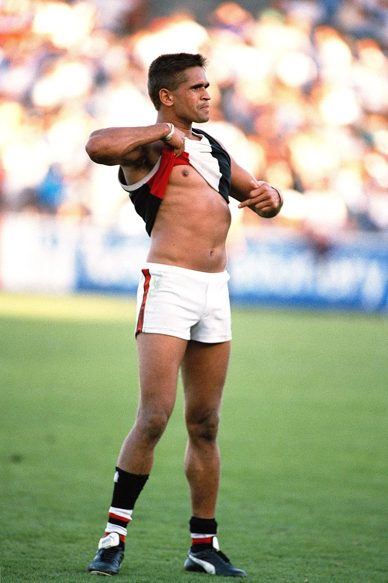 Nicky Winmar responds to racial abuse by spectators on 17 April 1993 during St Kilda’s football match against Collingwood.