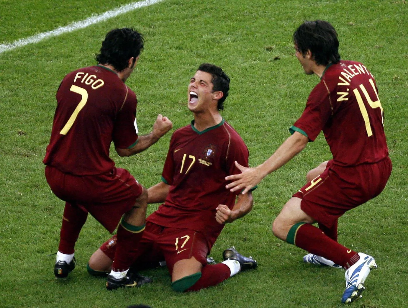 Cristiano Ronaldo roars with delight as Luís Figo and Nuno Valente show their appreciation after the forward becomes Portugal’s youngest scorer at a World Cup in 2006.