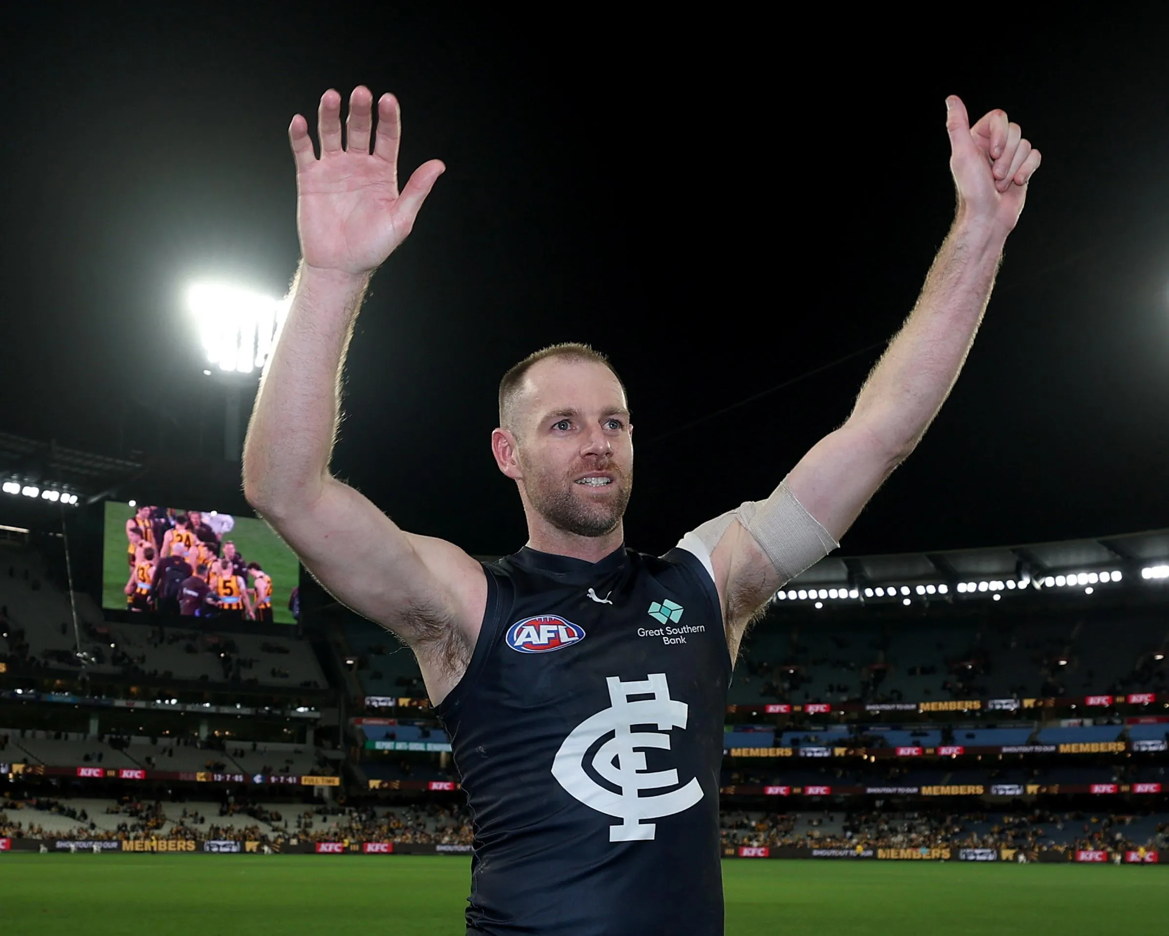 Sam Docherty celebrates the last of his 184 AFL games in 2025
