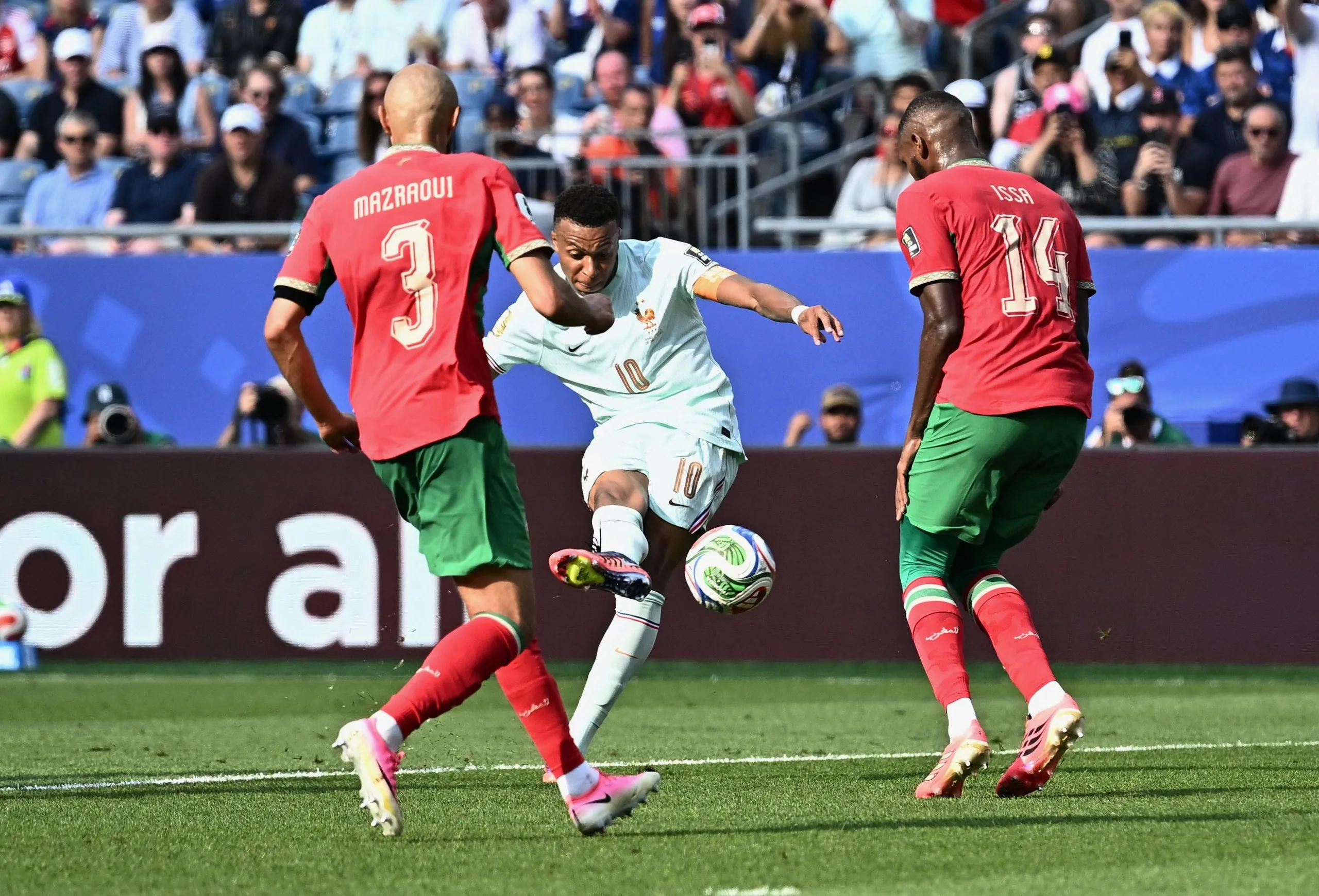 Kylian Mbappé curls home the opening goal for France