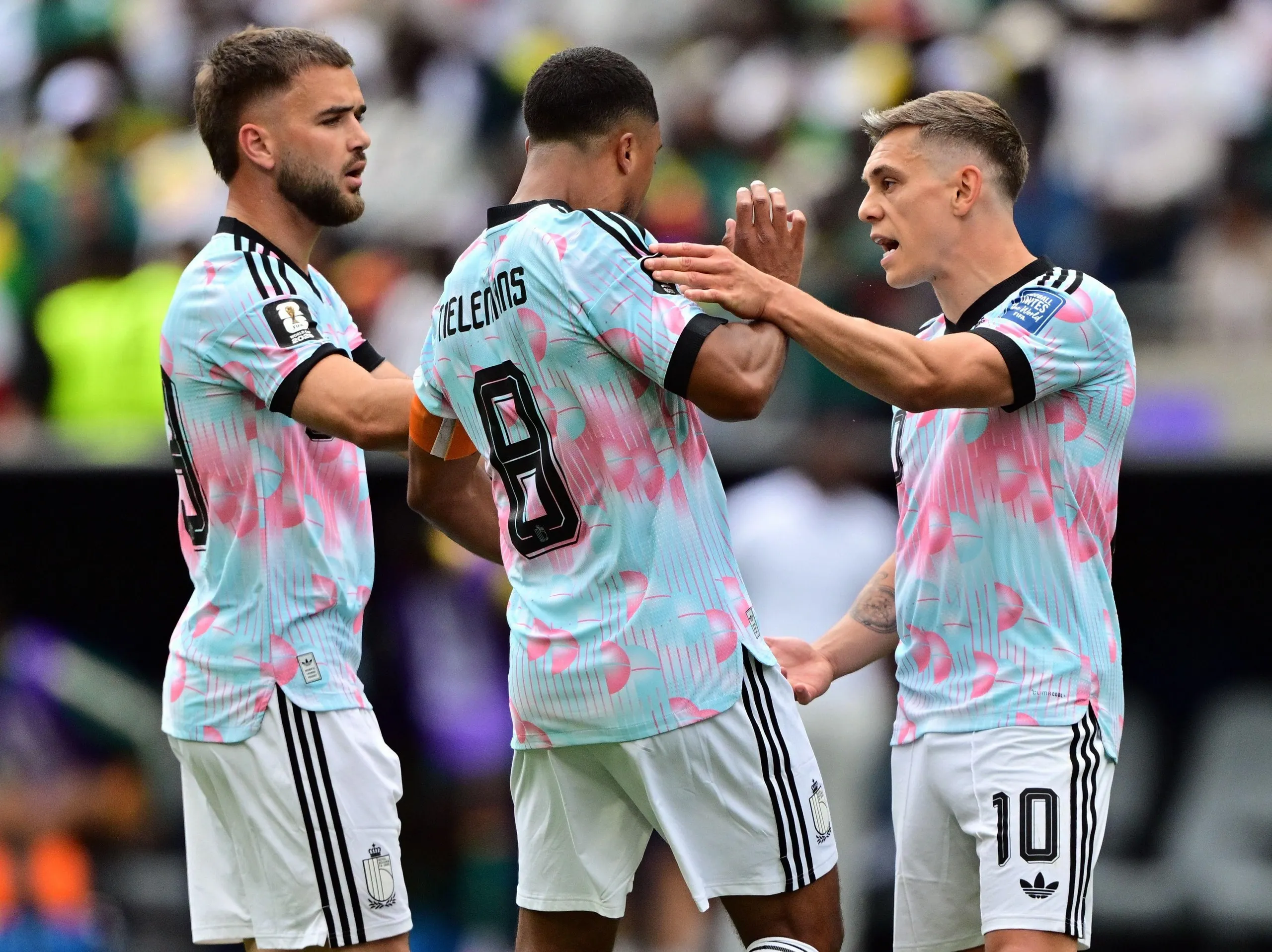 A heated exchange between Belgium's Leandro Trossard and Youri Tielemans