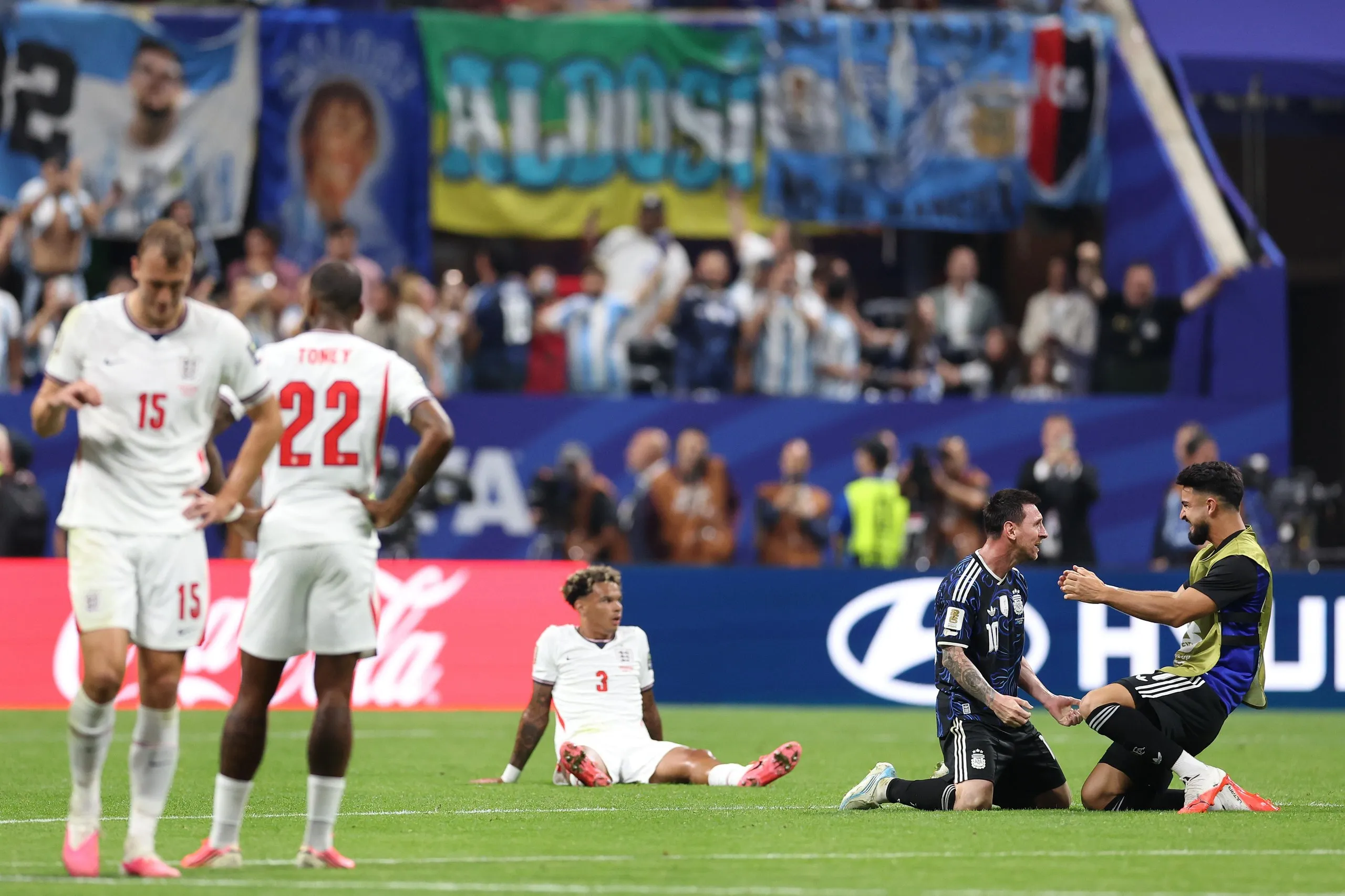 Lionel Messi and Argentina teammates celebrate after defeating England in a World Cup semi-final