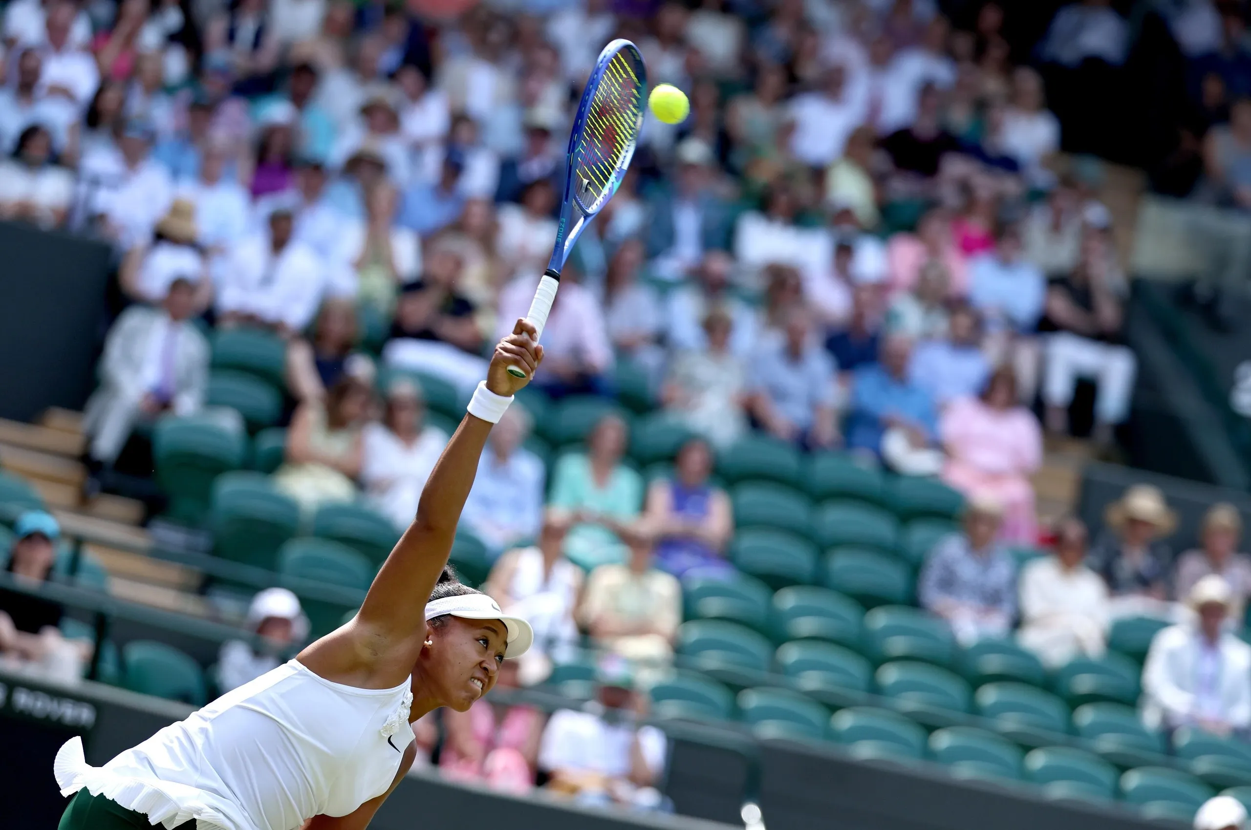 Naomi Osaka serves to Daria Kasatkina