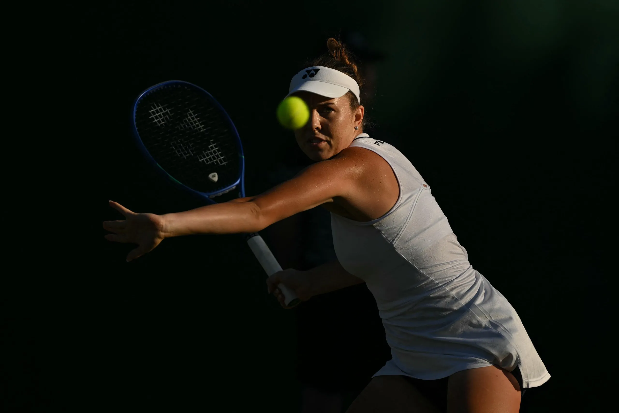 Linda Noskova focuses on the ball during her win over Camila Osorio.